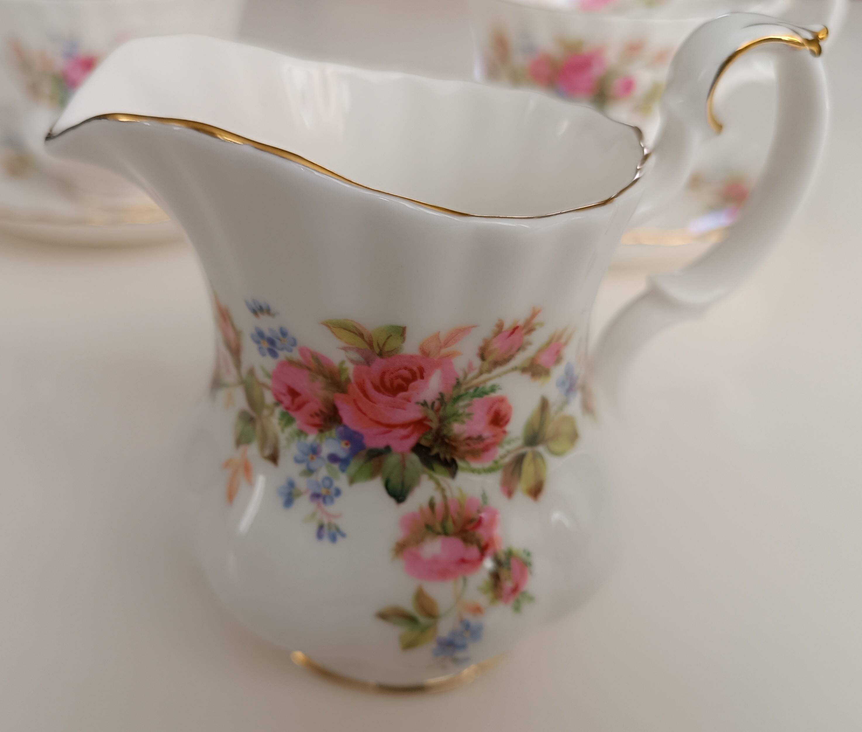 Royal Albert English porcelain set of 2 cups, saucers, and milk jug.