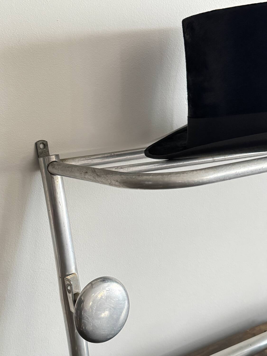 Vintage wall-mounted aluminum coat rack