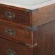 Old wooden English desk from the early 20th century with brass elements