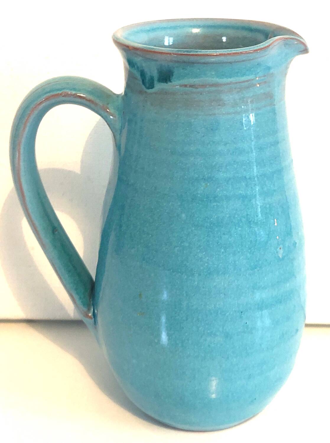 Blue ceramic pitcher