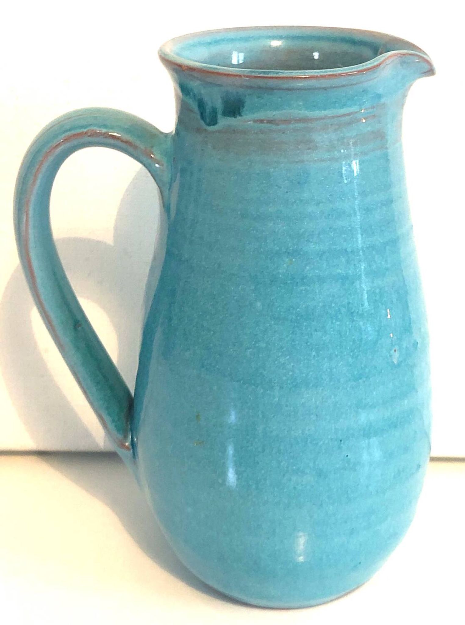 Blue ceramic pitcher
