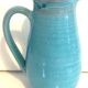 Blue ceramic pitcher