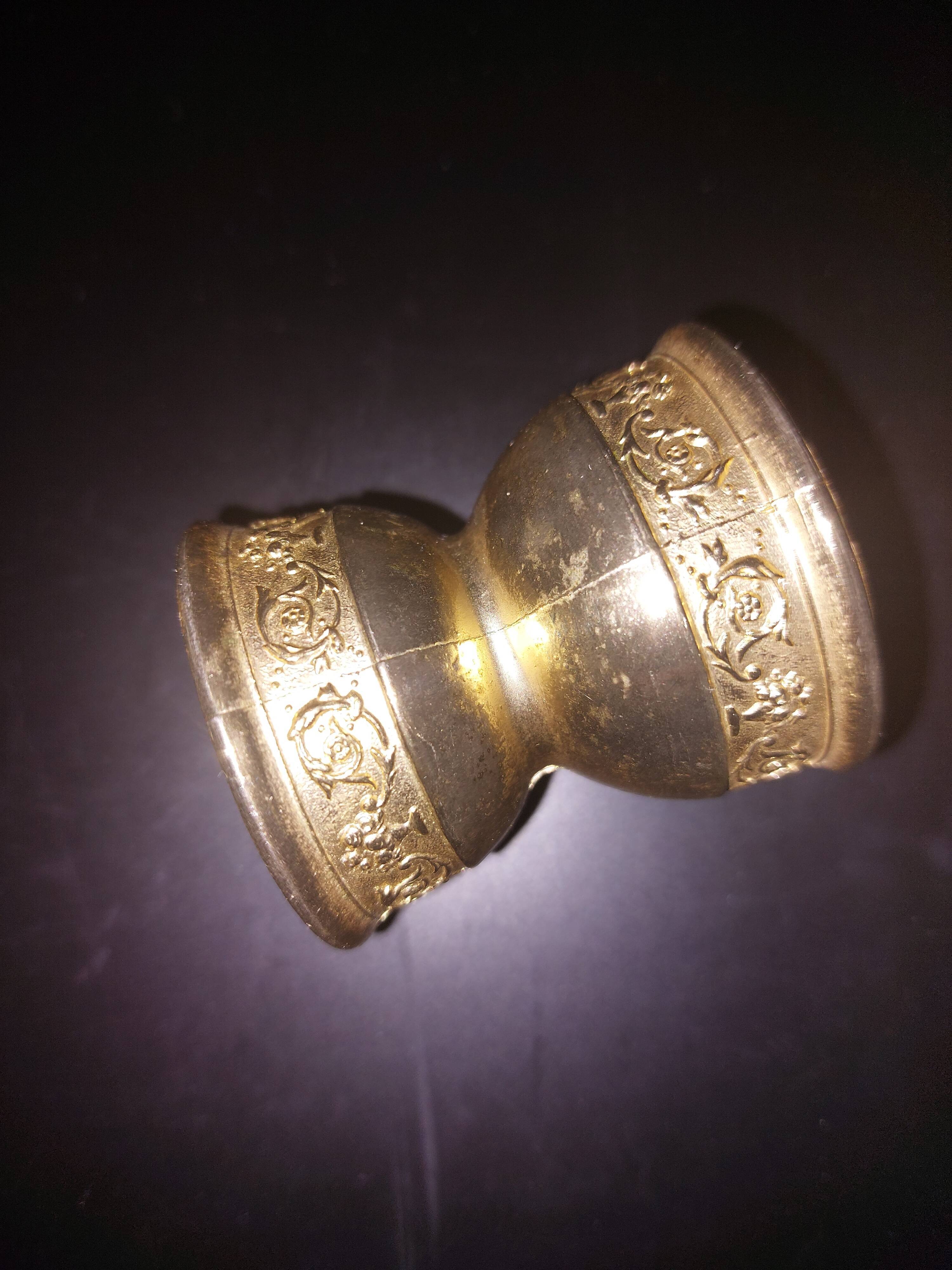 Duo of cockroaches, metal.