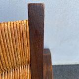 Vintage armchair in straw and brutalist wood