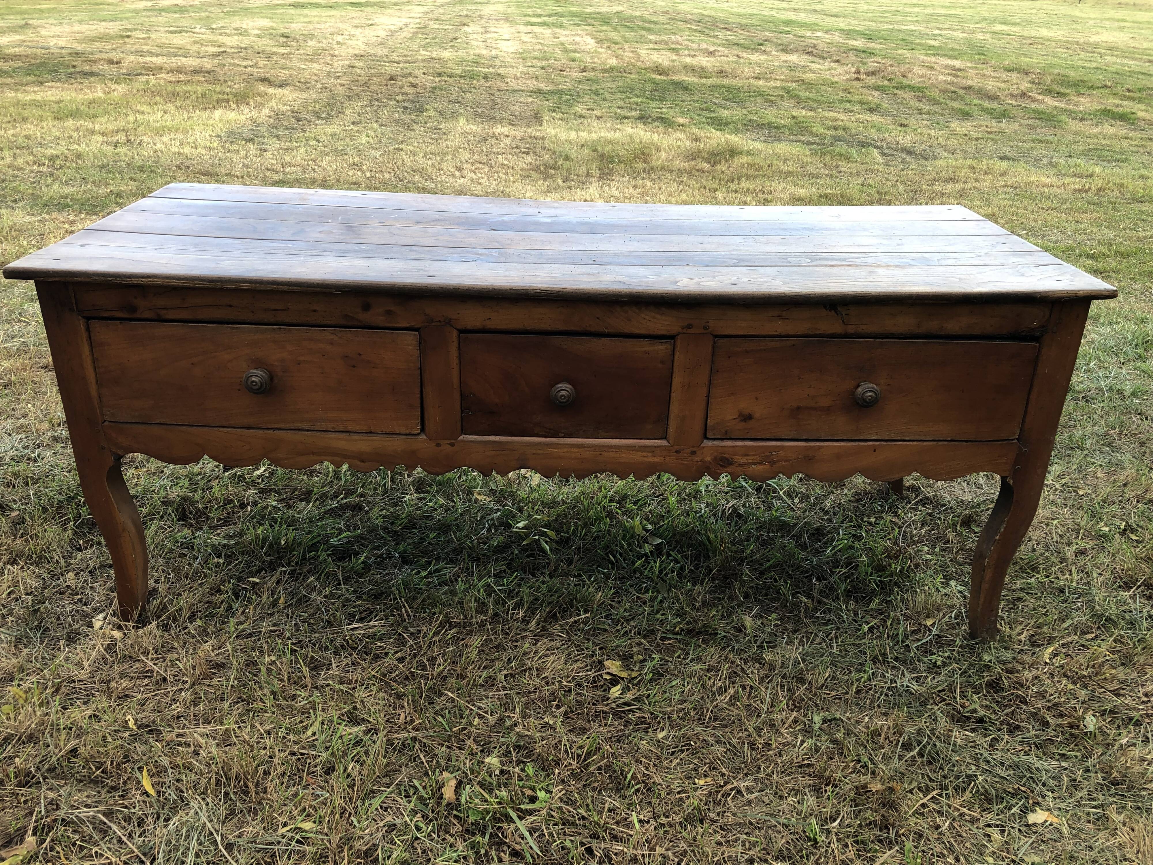Antique Louis XV paneled table with 3 front drawers in solid cherry wood
