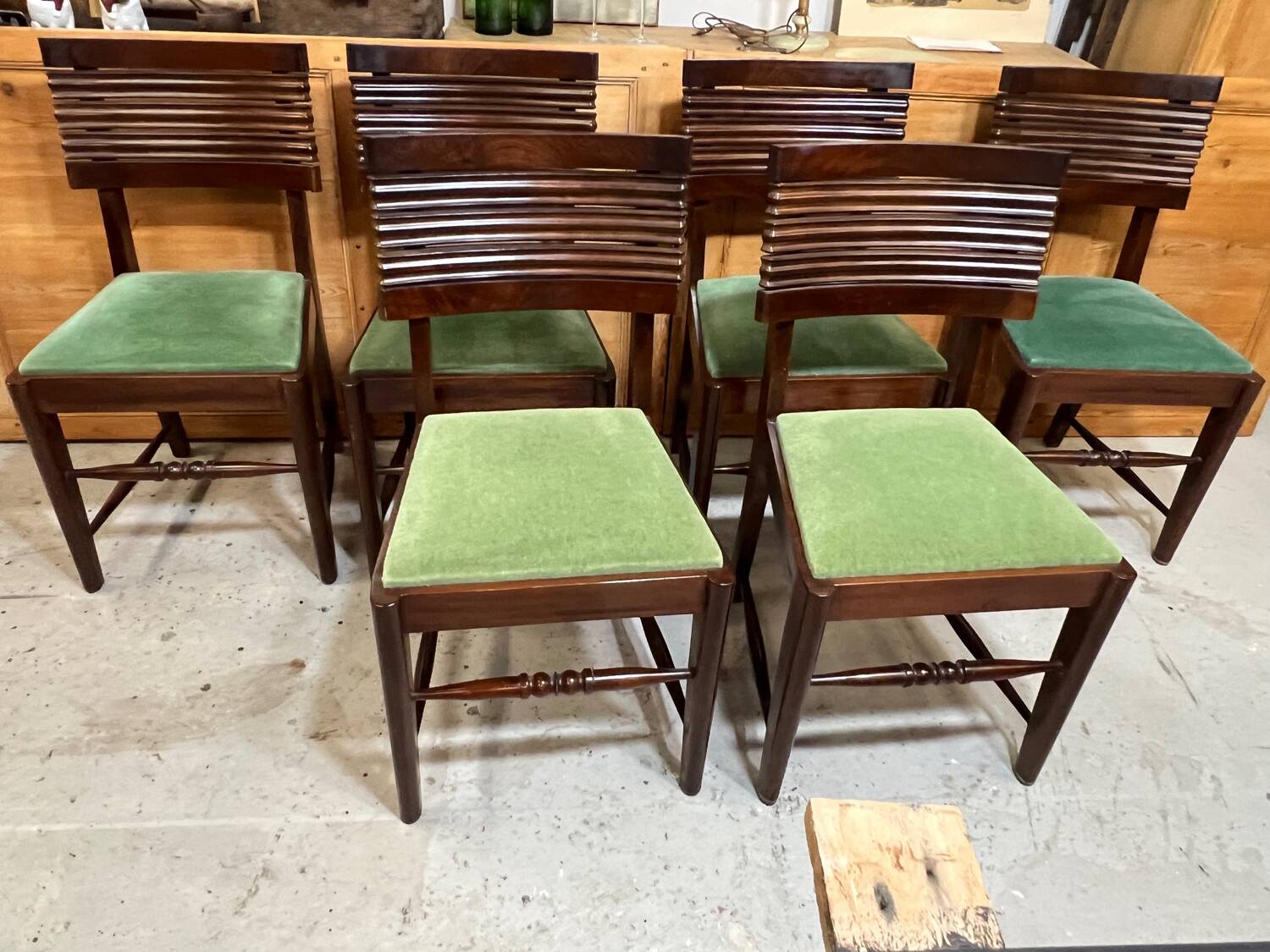 Set of 6 chairs and 2 armchairs by Gaston Poisson