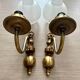 Pair of vintage wall sconces in brass and frosted engraved glass.