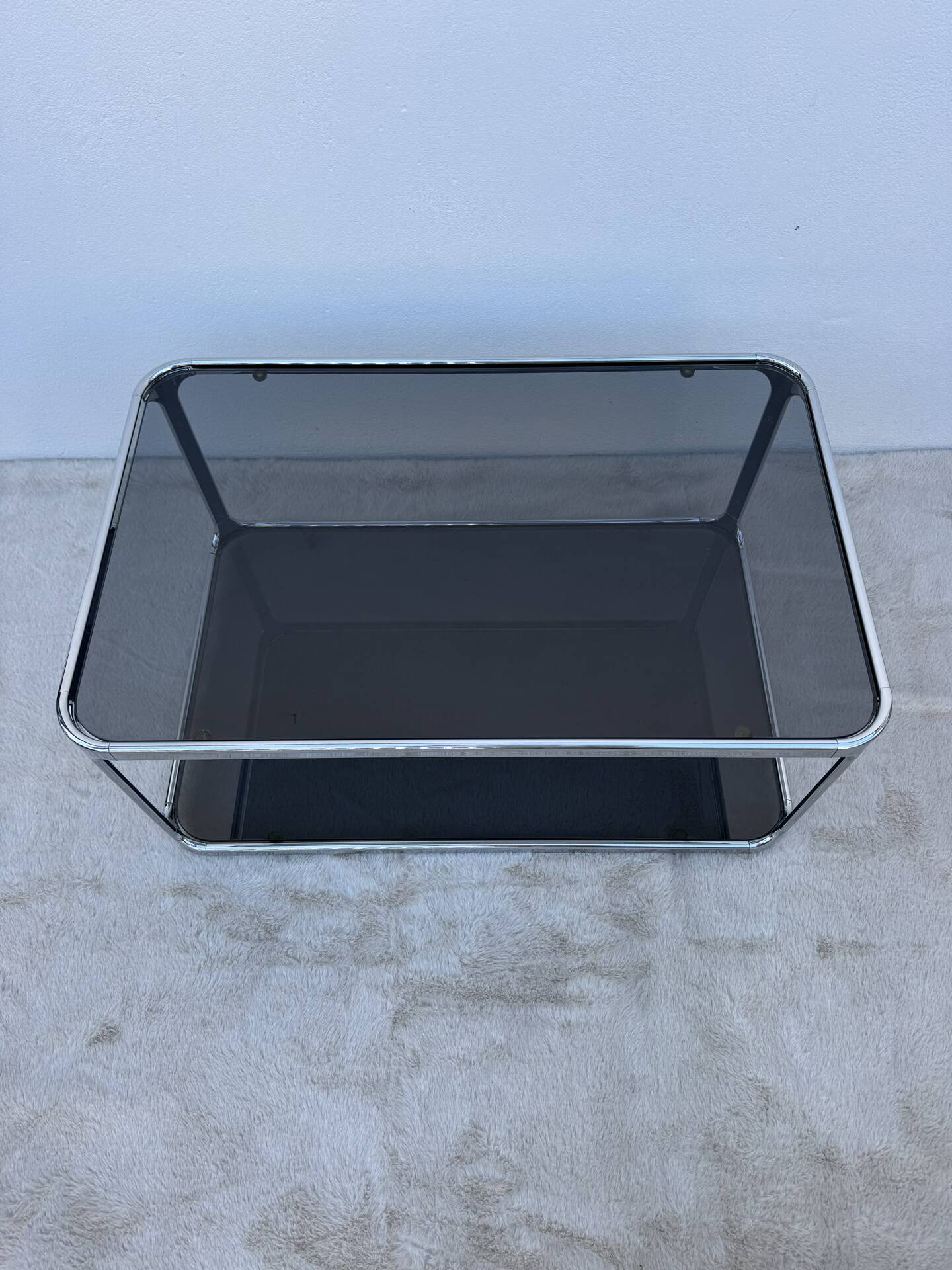 Chrome and smoked glass coffee table from the 1970s.