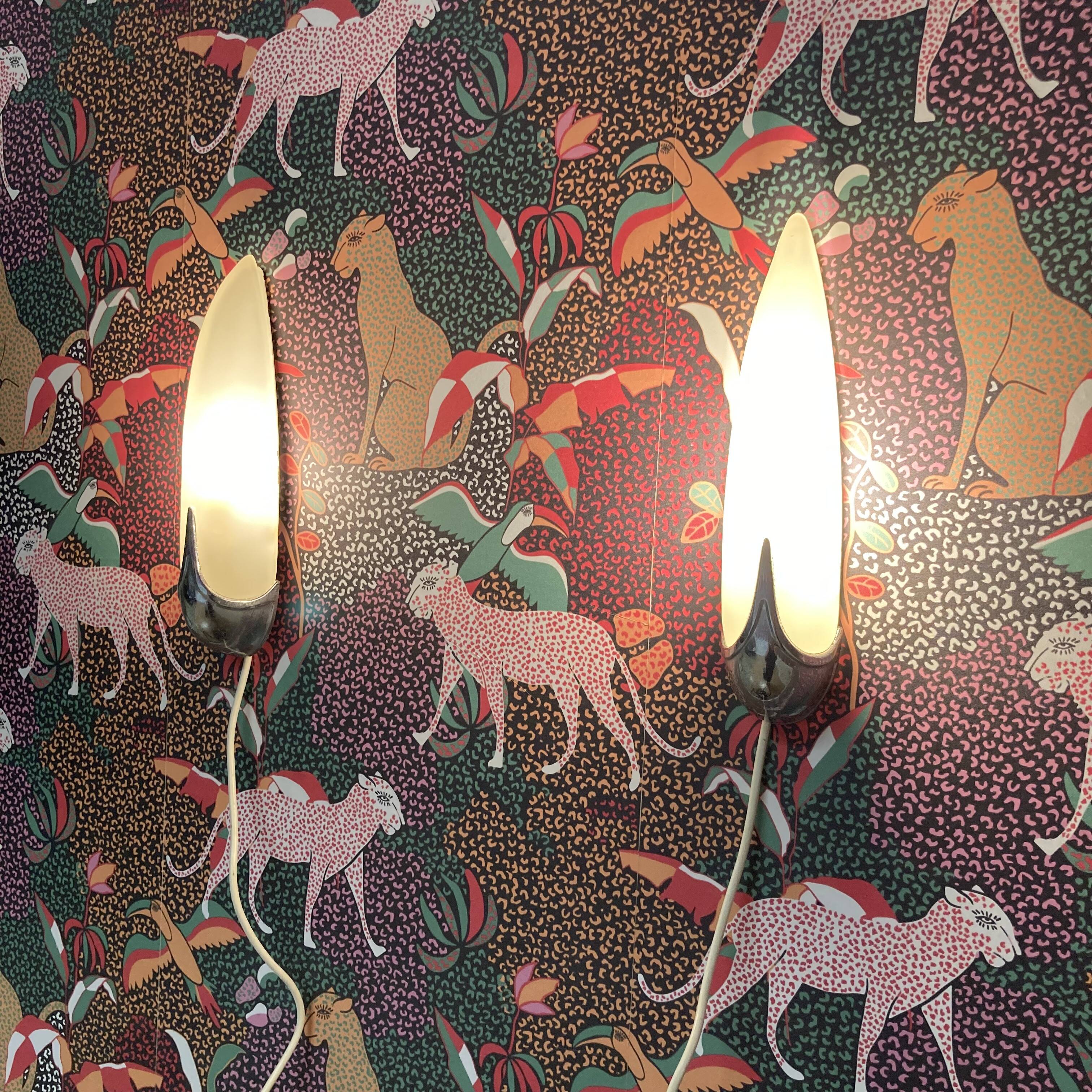 Pair of 1950s designer glass wall lights.