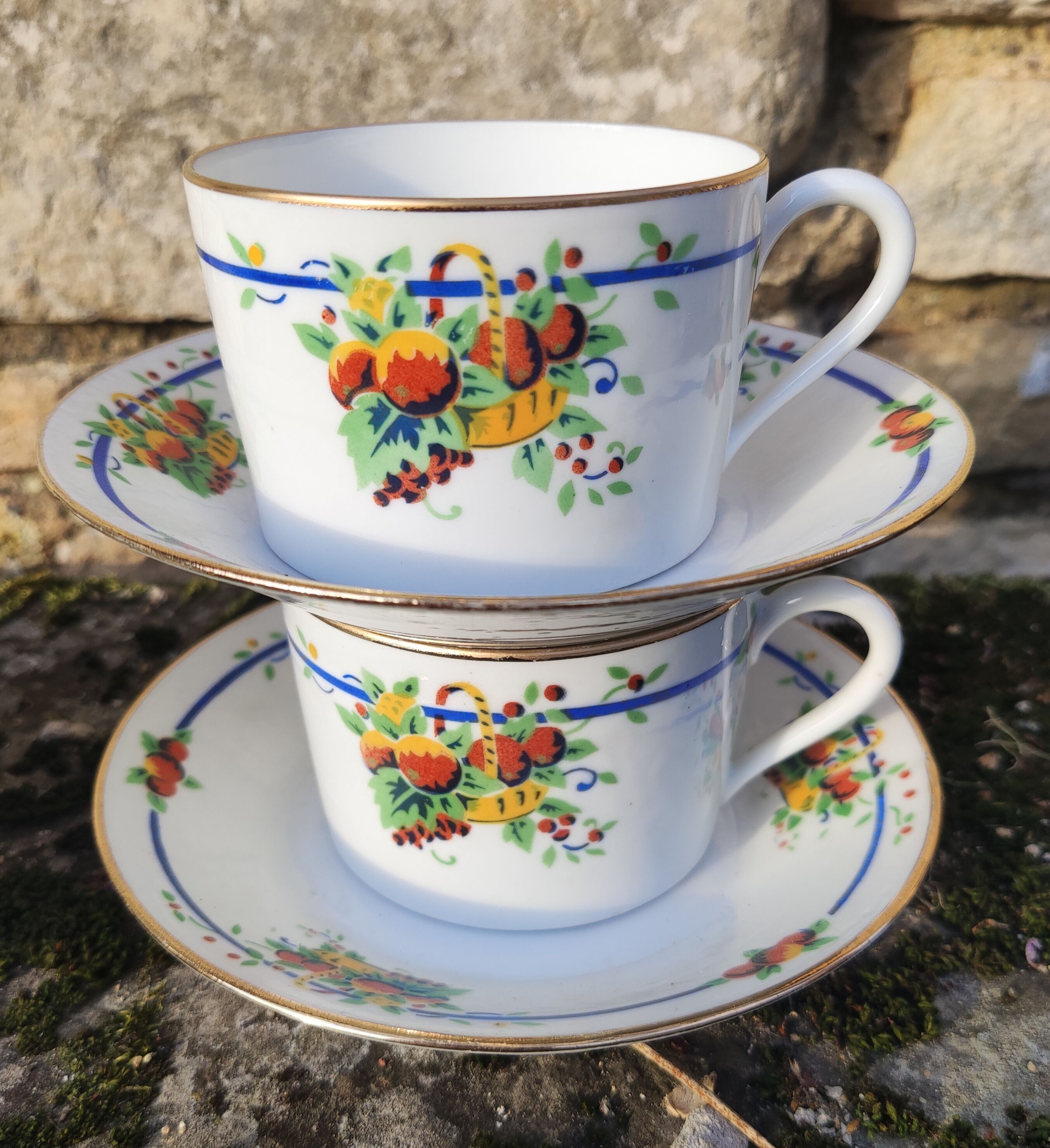 10 tea cups and creamer in Limoges porcelain