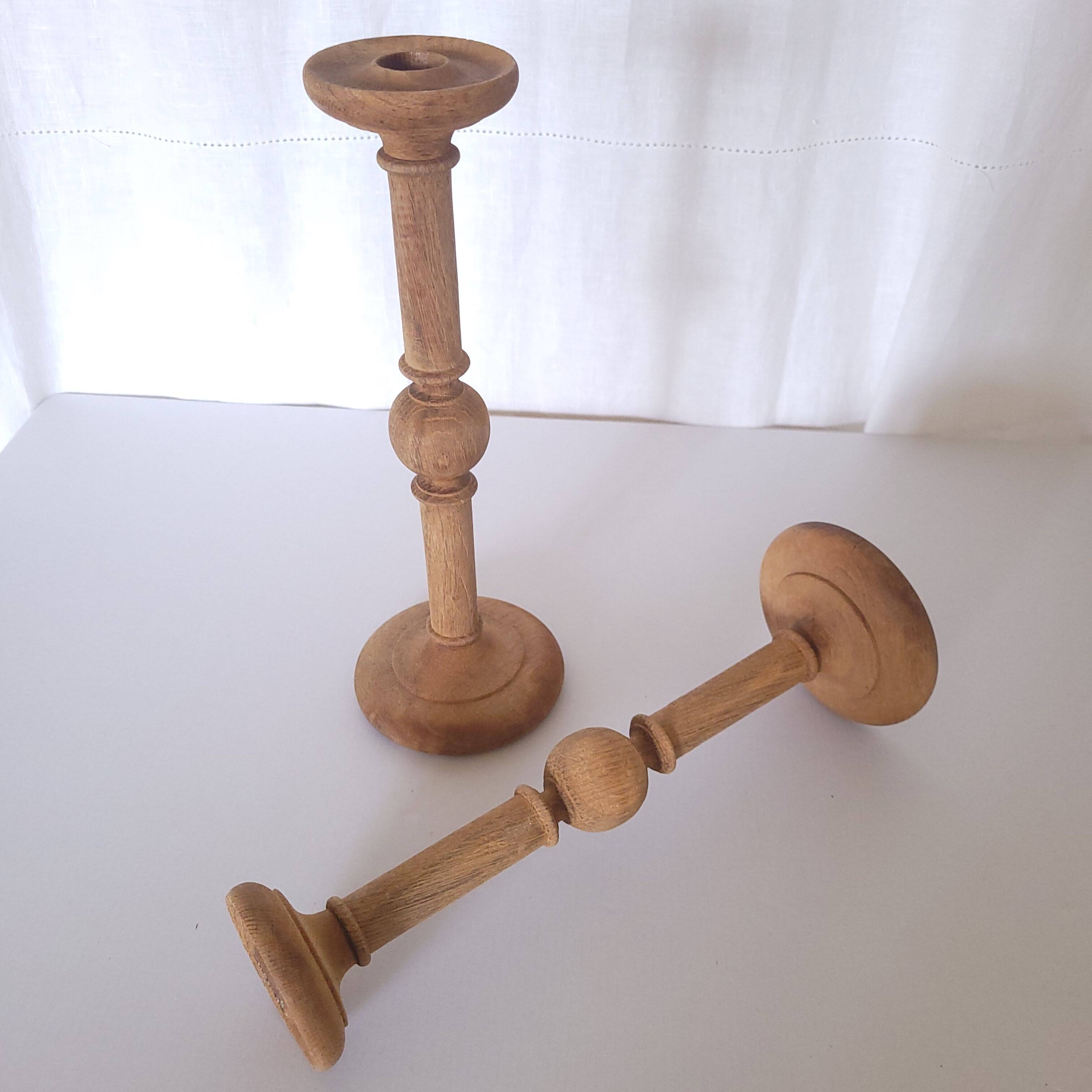 Large carved wooden candlesticks