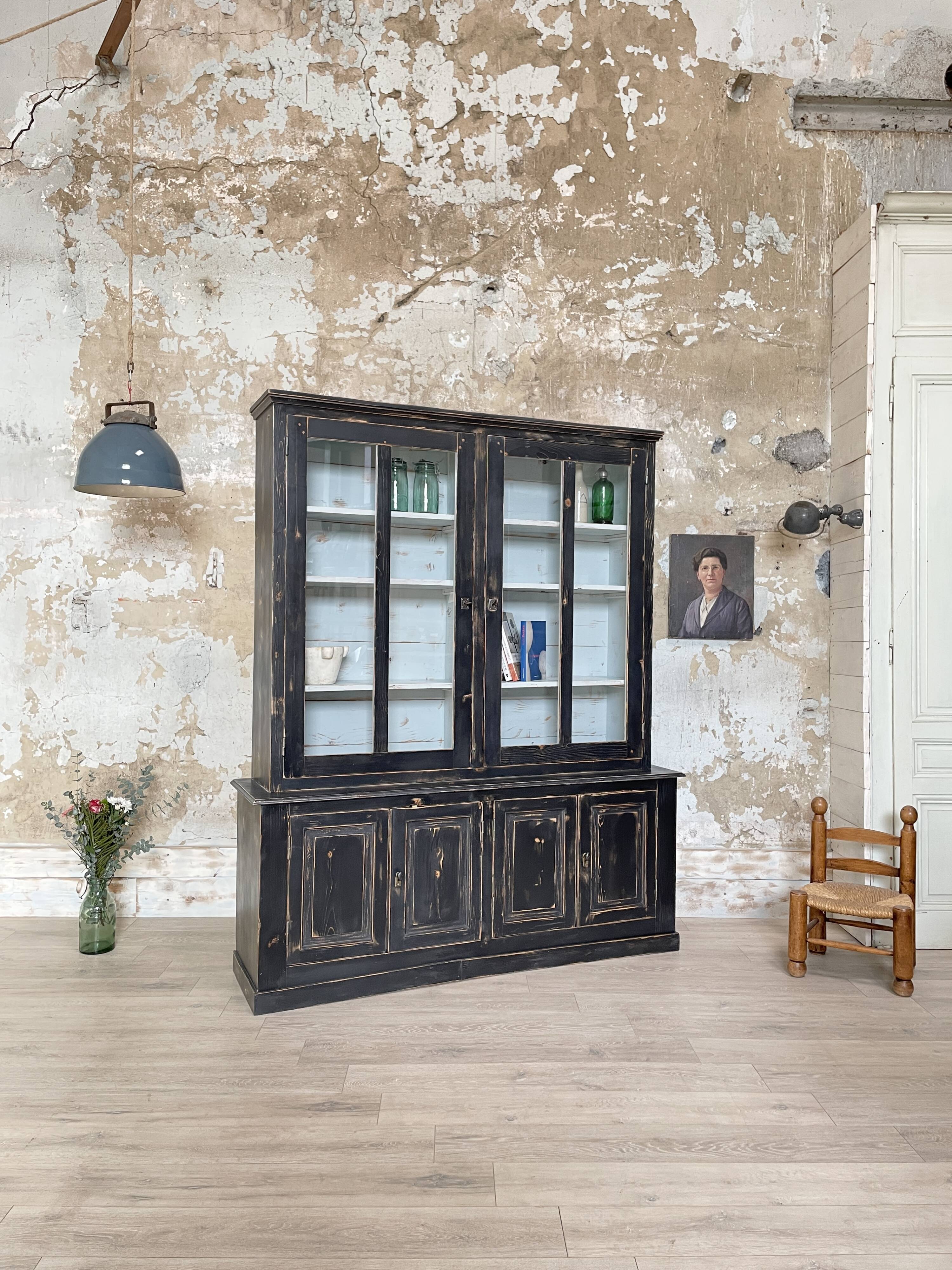 Display cabinet in patinated wood