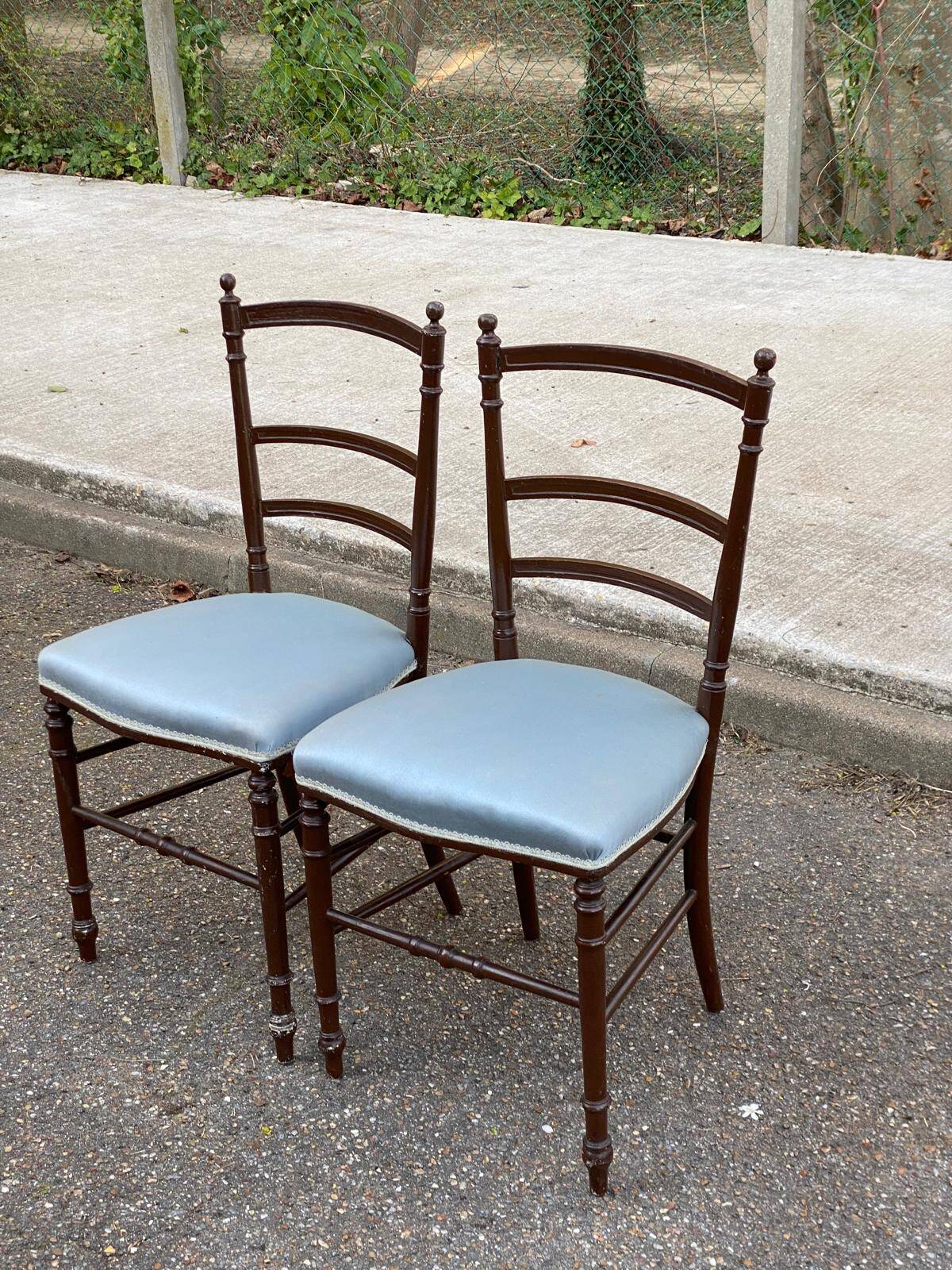 2 Napoleon III chairs in solid wood and blue satin fabric.