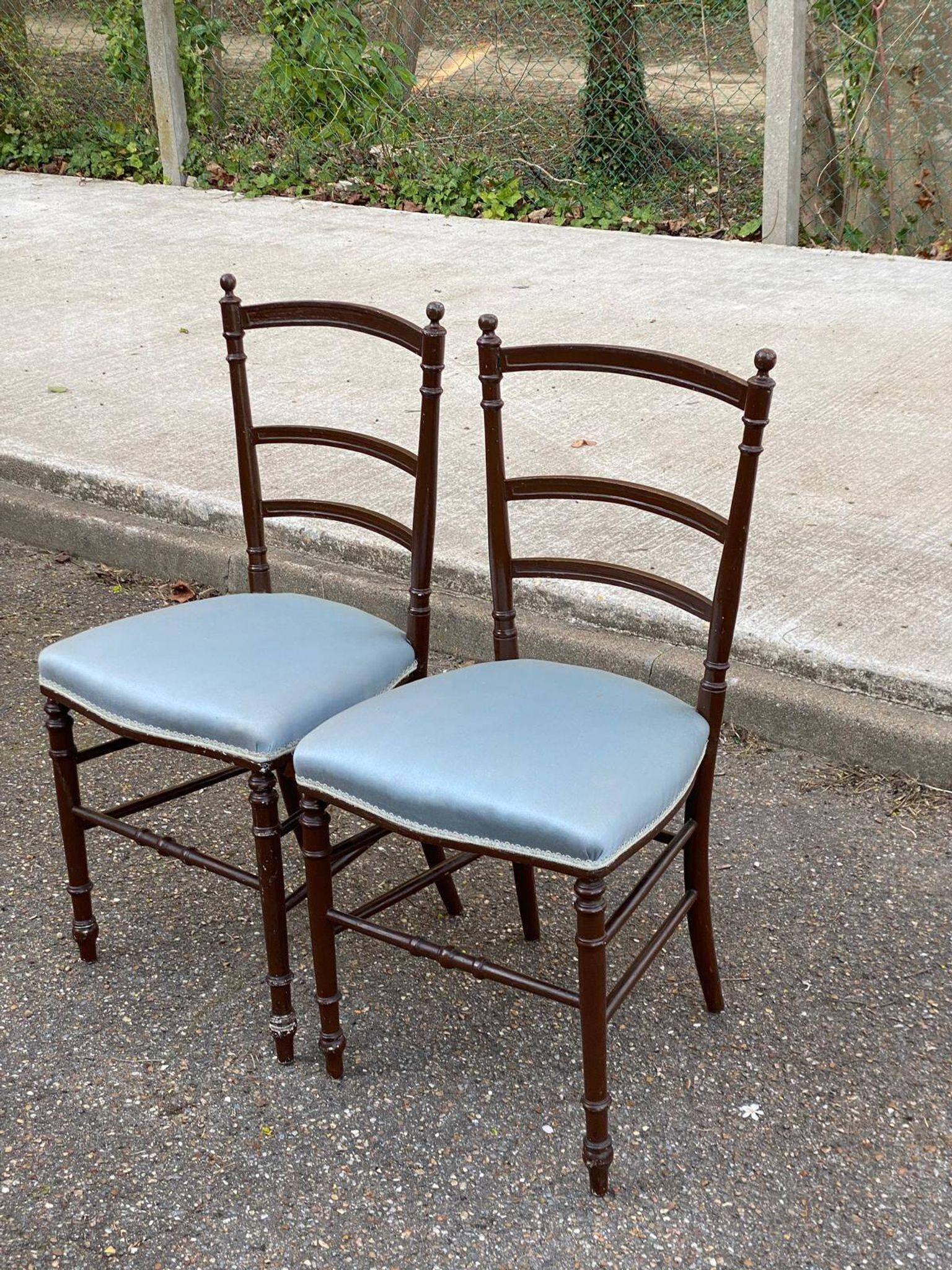 2 Napoleon III chairs in solid wood and blue satin fabric.