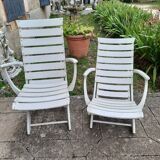 Pair of wooden garden armchairs