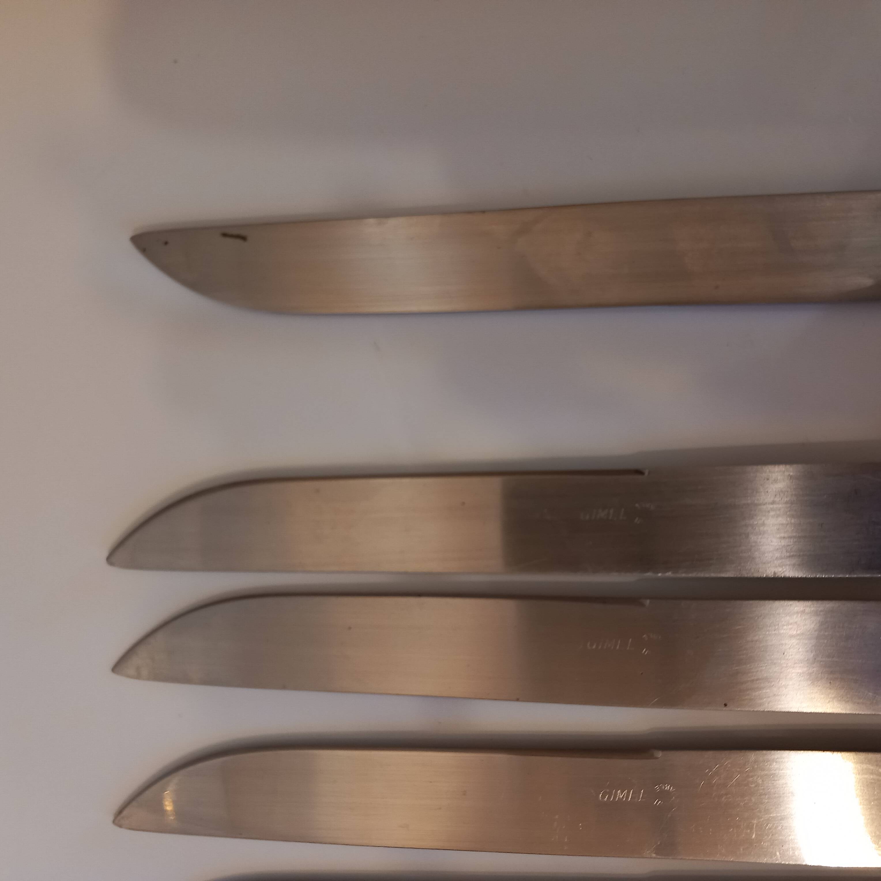 12 black Empire style table knives with silver ferrule Gimel