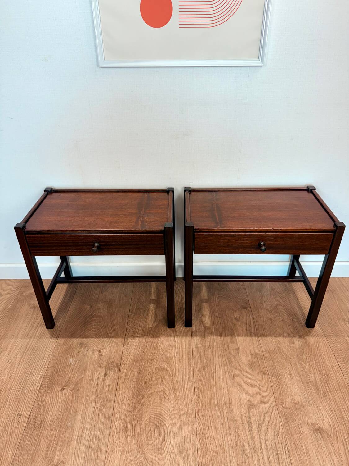 Pair of walnut bedside tables designed by Jacques Hauville for Roche Bobois.