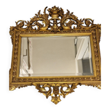 Miroir Napoléon III en stuc doré