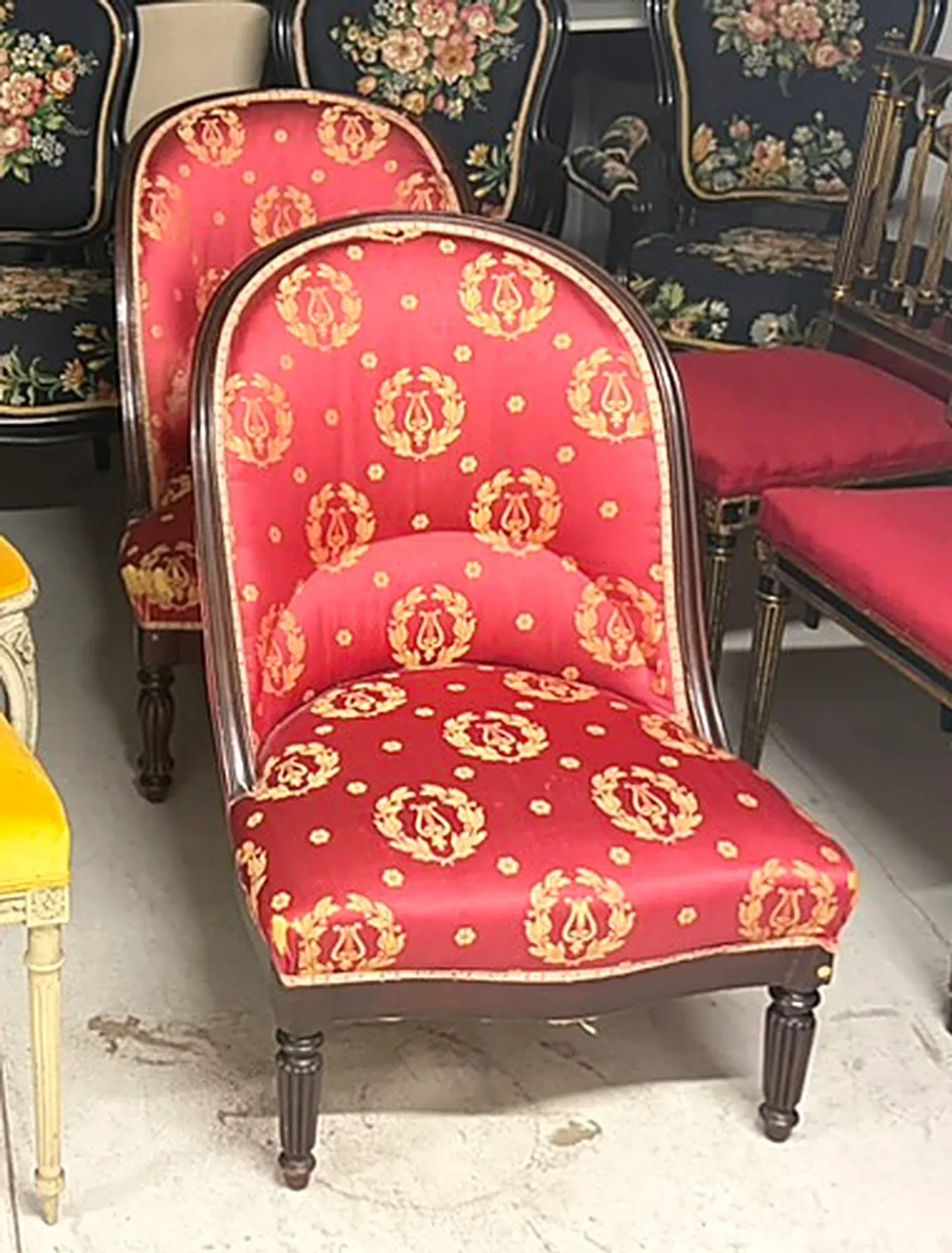 Set of 2 Empire period chairs, red silk with gold trim.