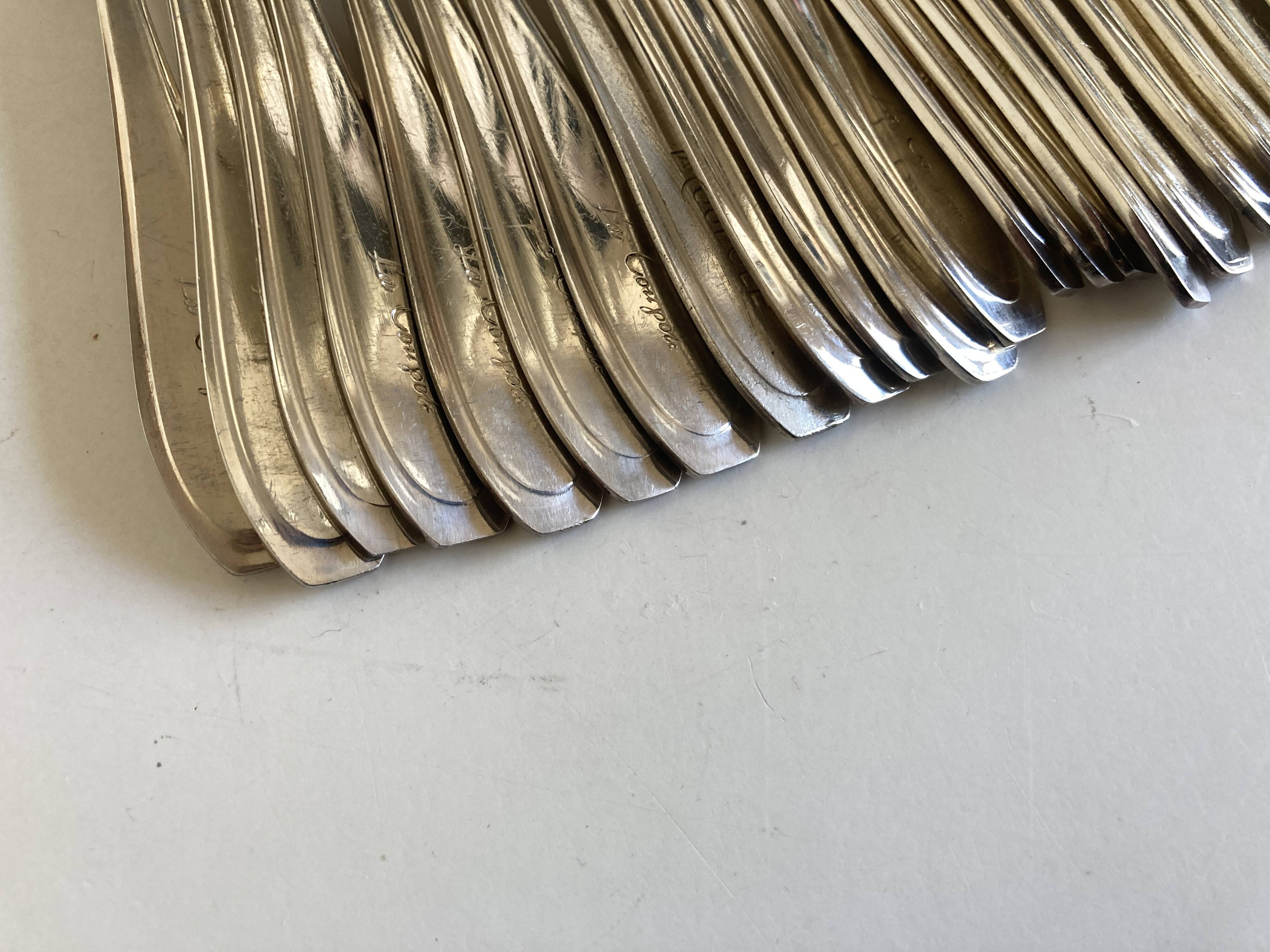 Set of 12 knives and 12 forks of brasserie La Coupole 1970