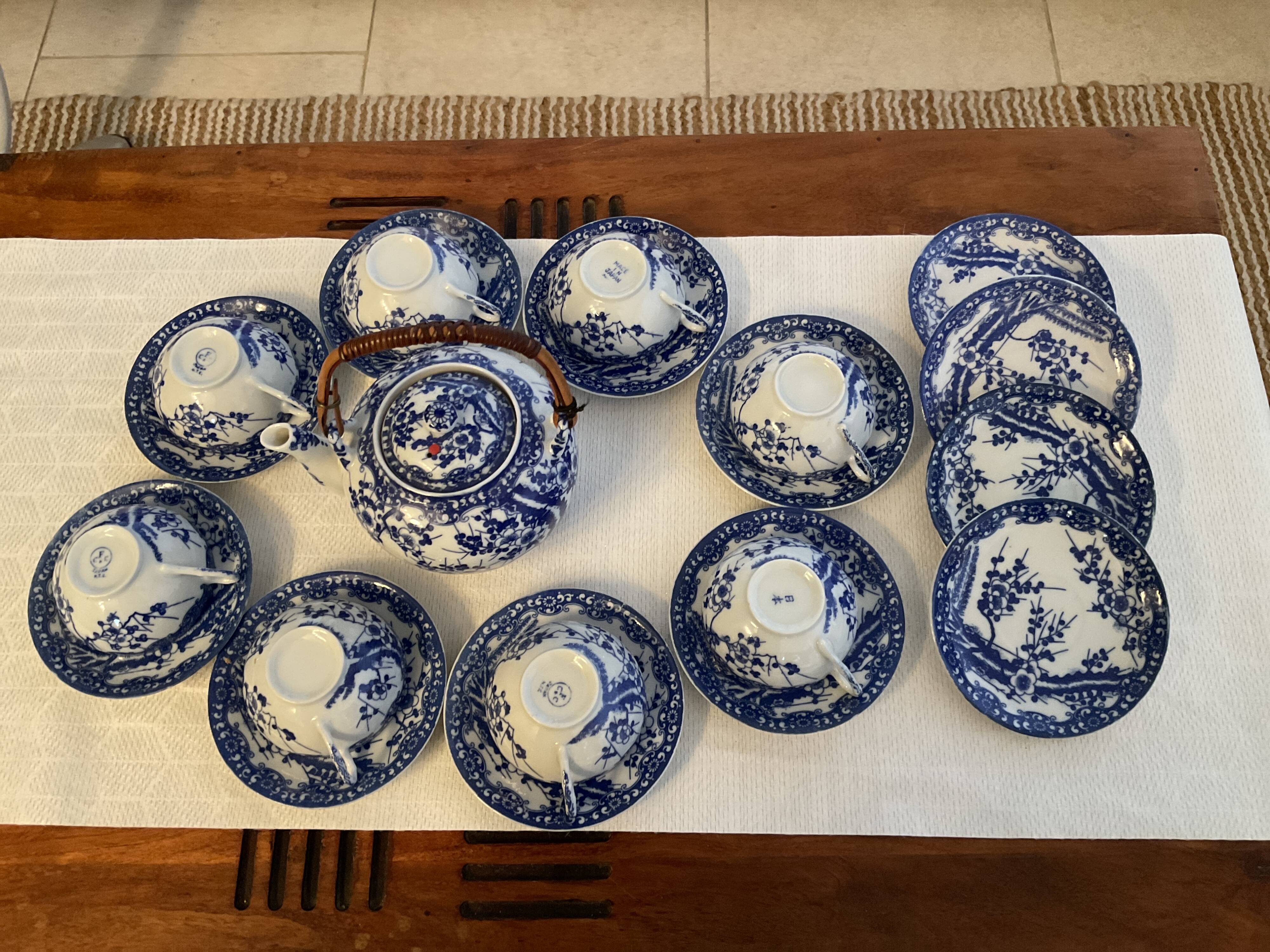 Japanese tea service with cherry blossom decoration in fine porcelain.