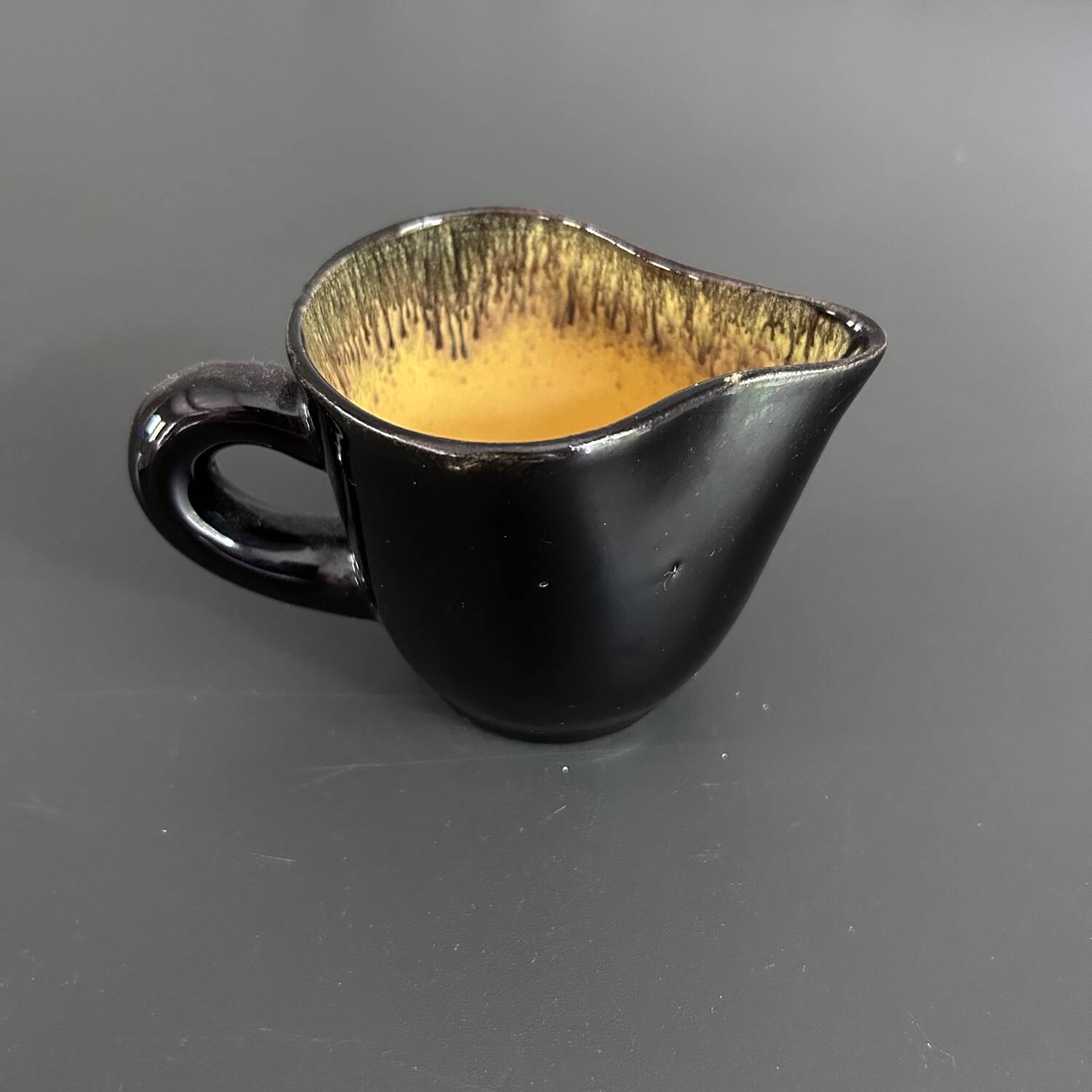 Keraluc black and yellow creamer