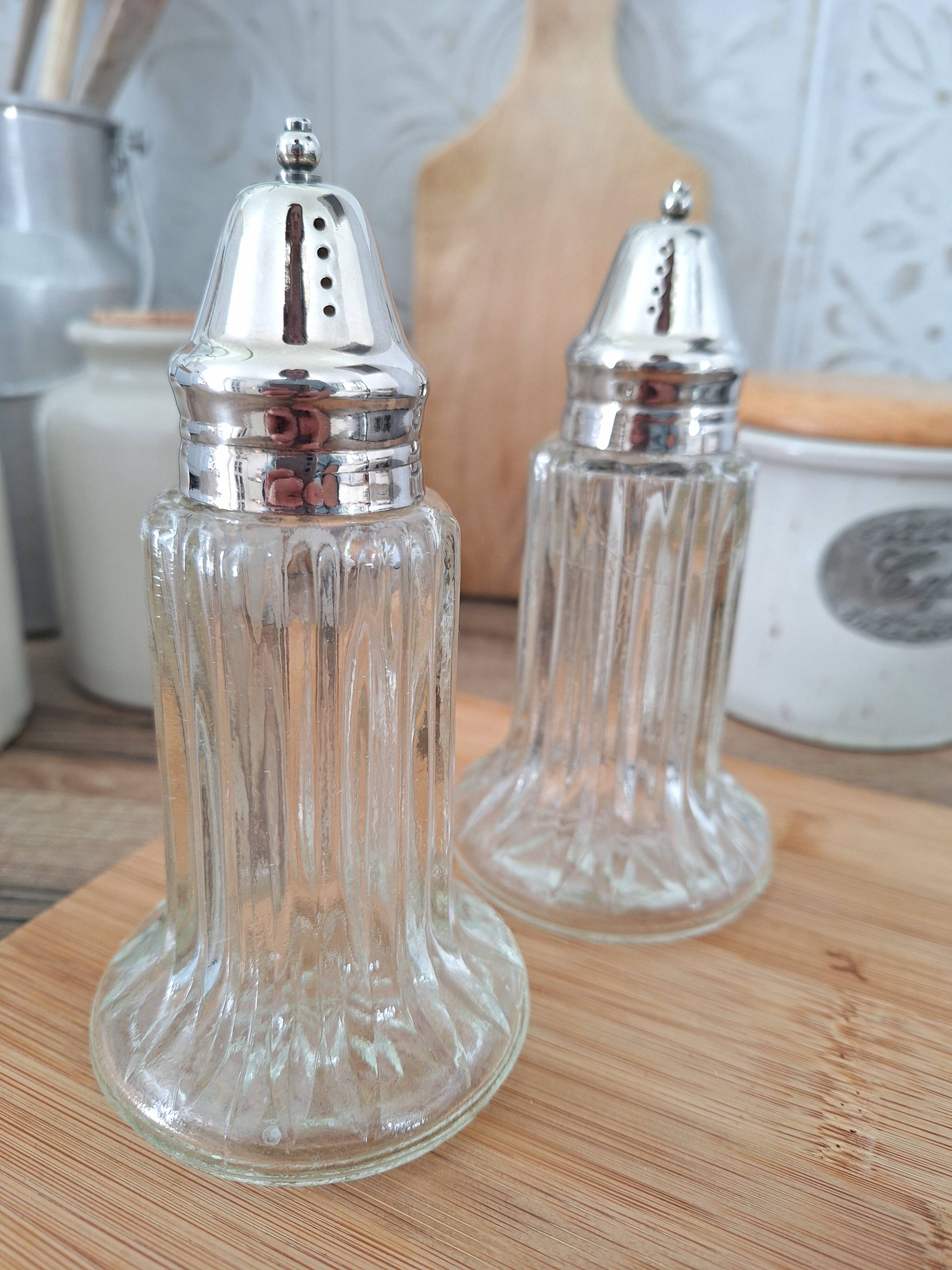 Glass and metal salt and pepper shakers