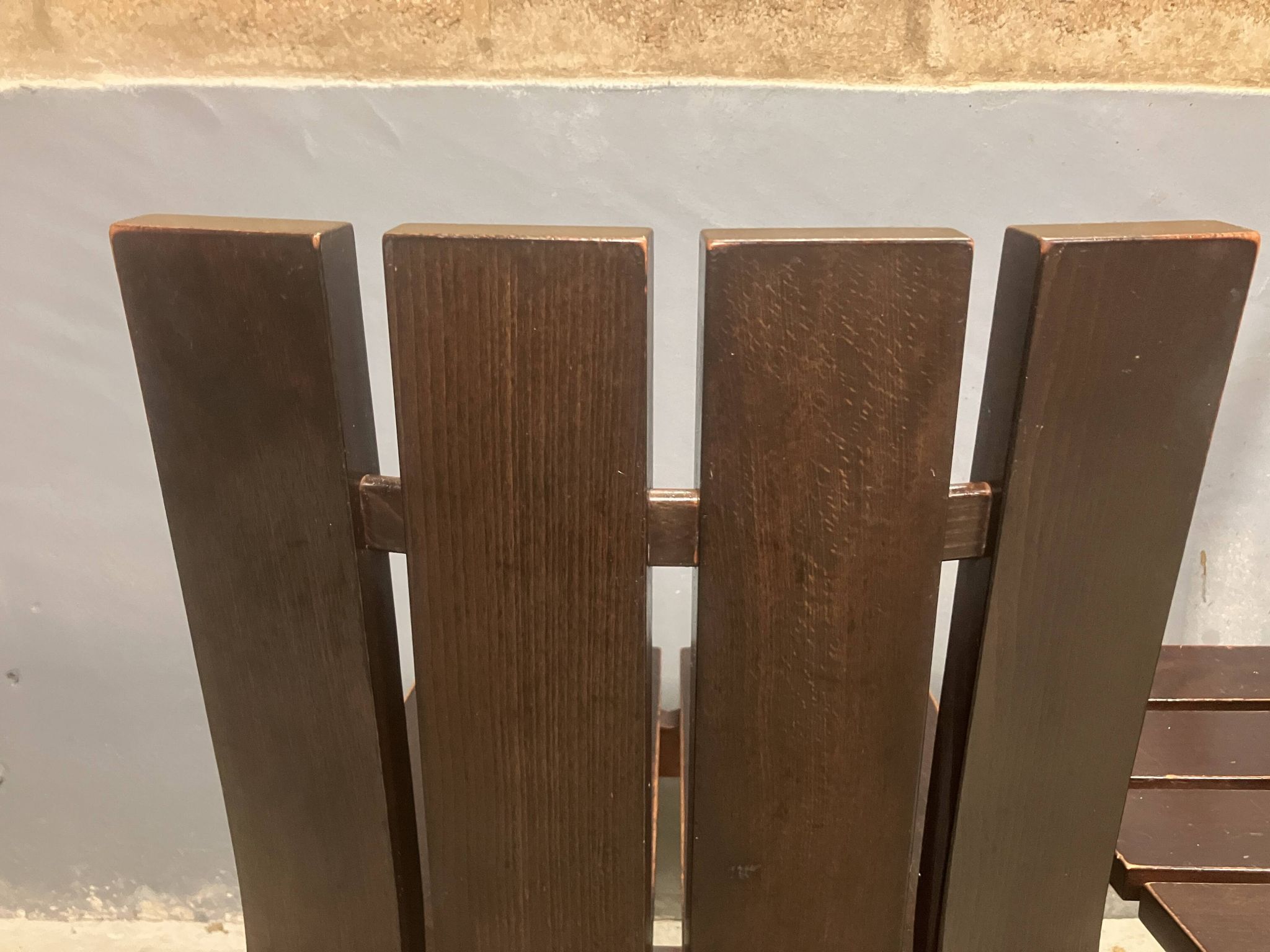 Brutalist and modernist dining chairs from the 1970s in architectural brown wood.