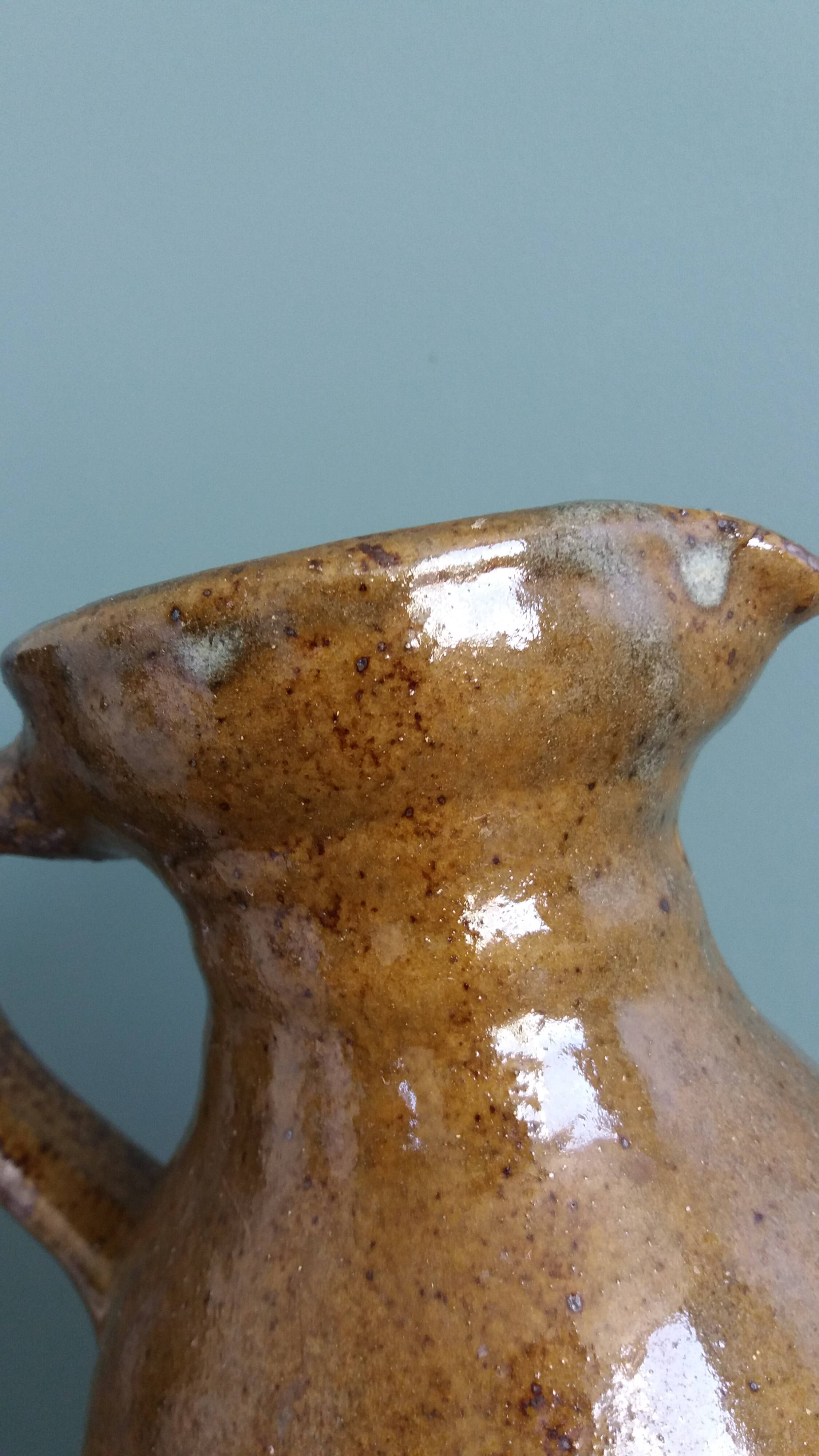 Rustic stoneware jug, chic countryside.