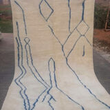 Moroccan Berber carpet Beni Ouarain with blue patterns 200x310cm