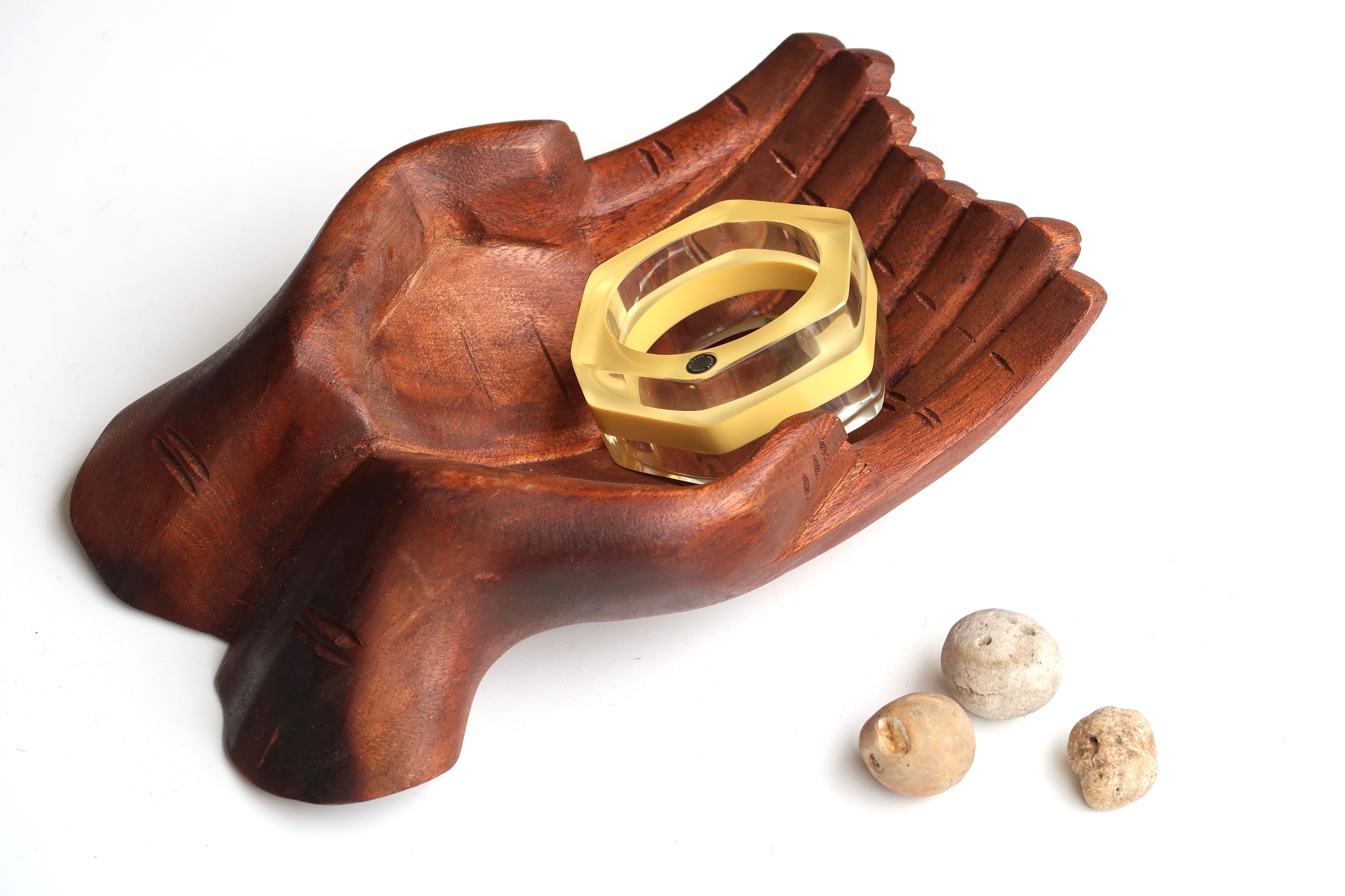 Empty pocket, hands joined in carved wood, 70s