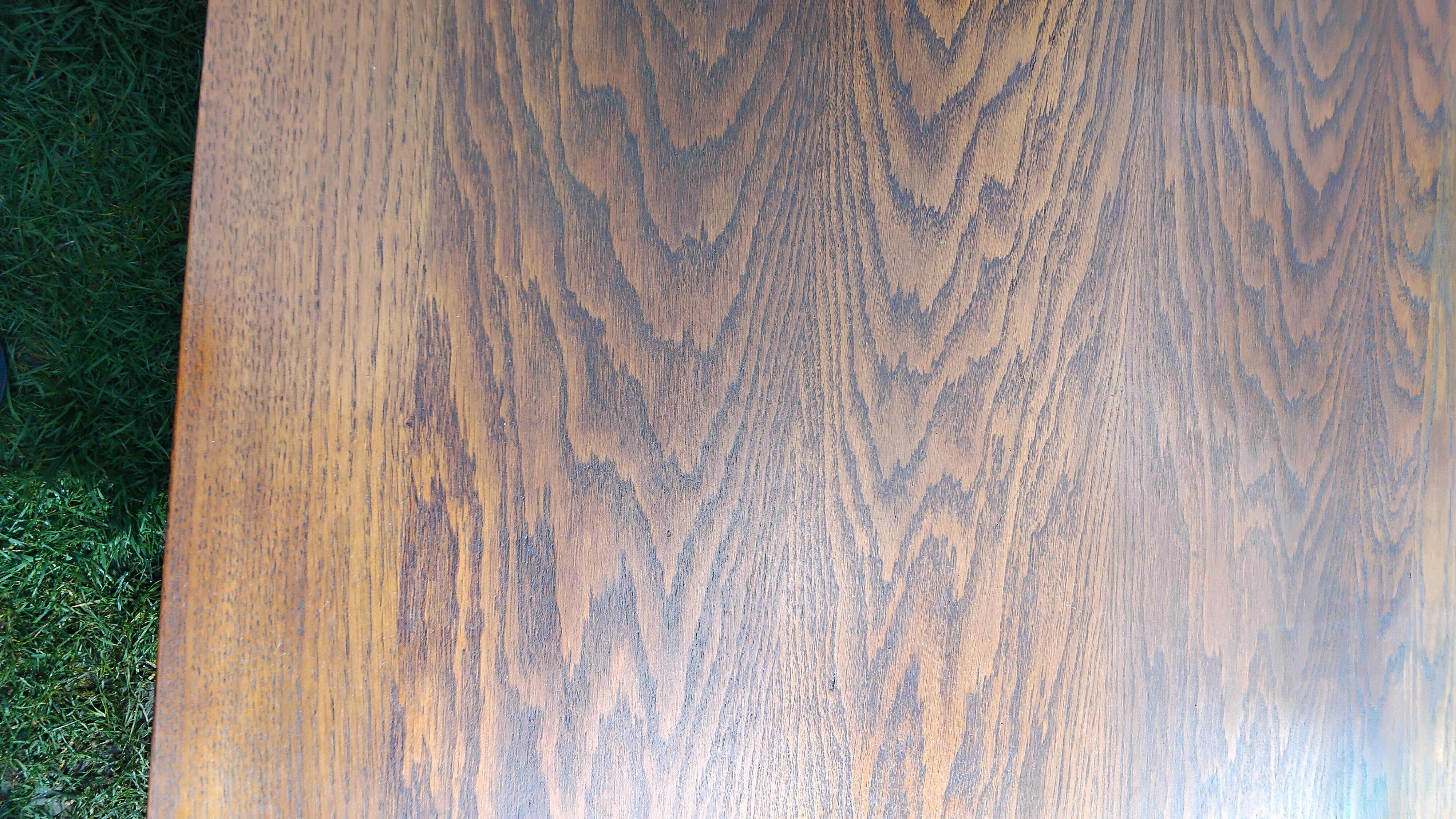 Vintage oak table with tapered legs.