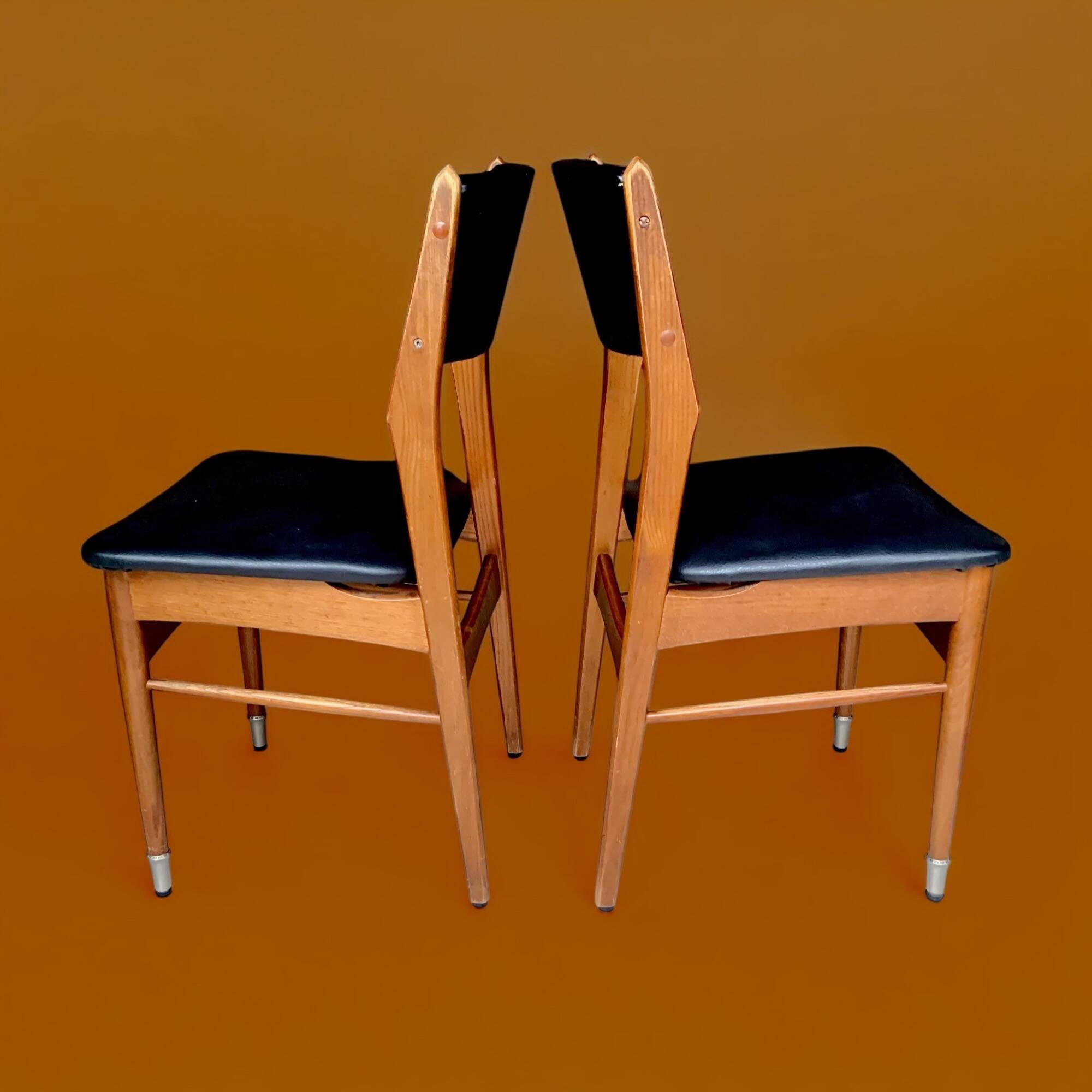 Pair of Scandinavian chairs in wood and black skai