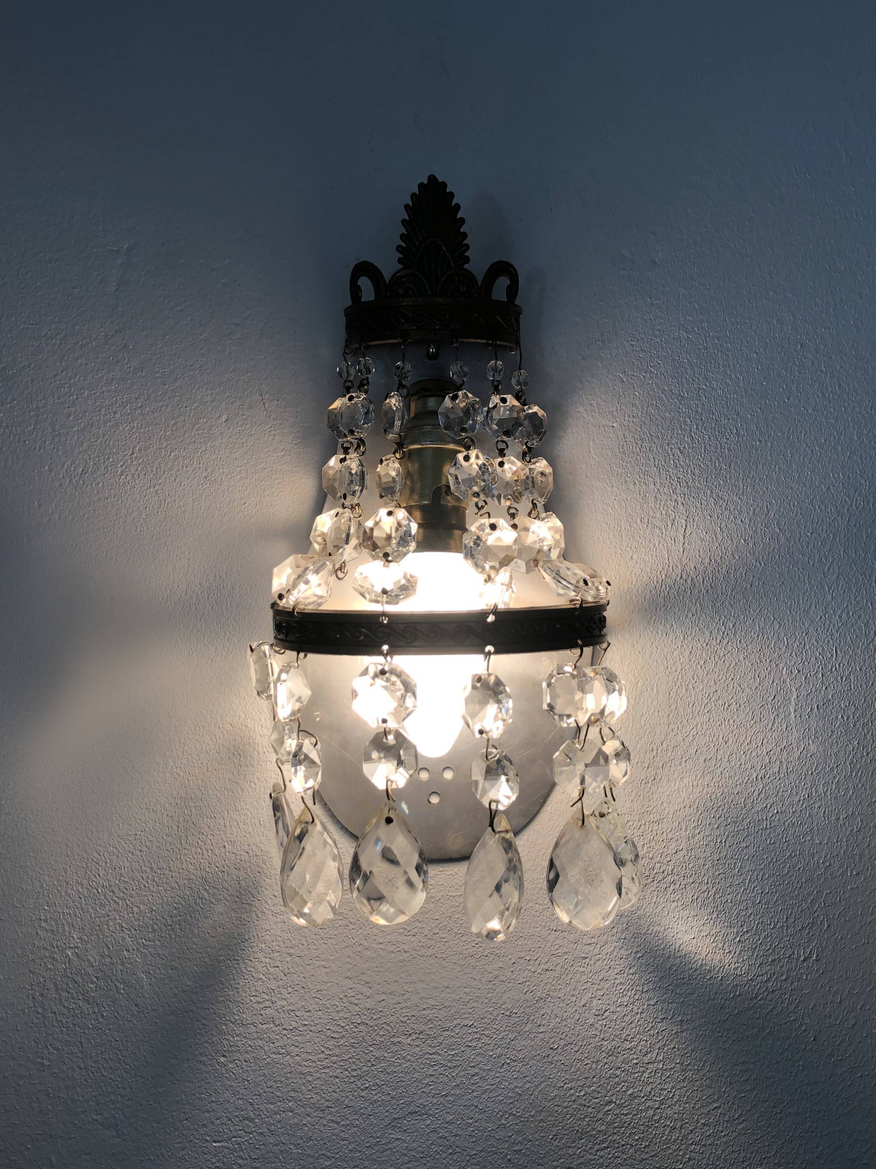 Pair of vintage hot air balloon wall sconces with glass tassels. Year 50