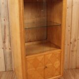 Art deco showcase in waved sycamore