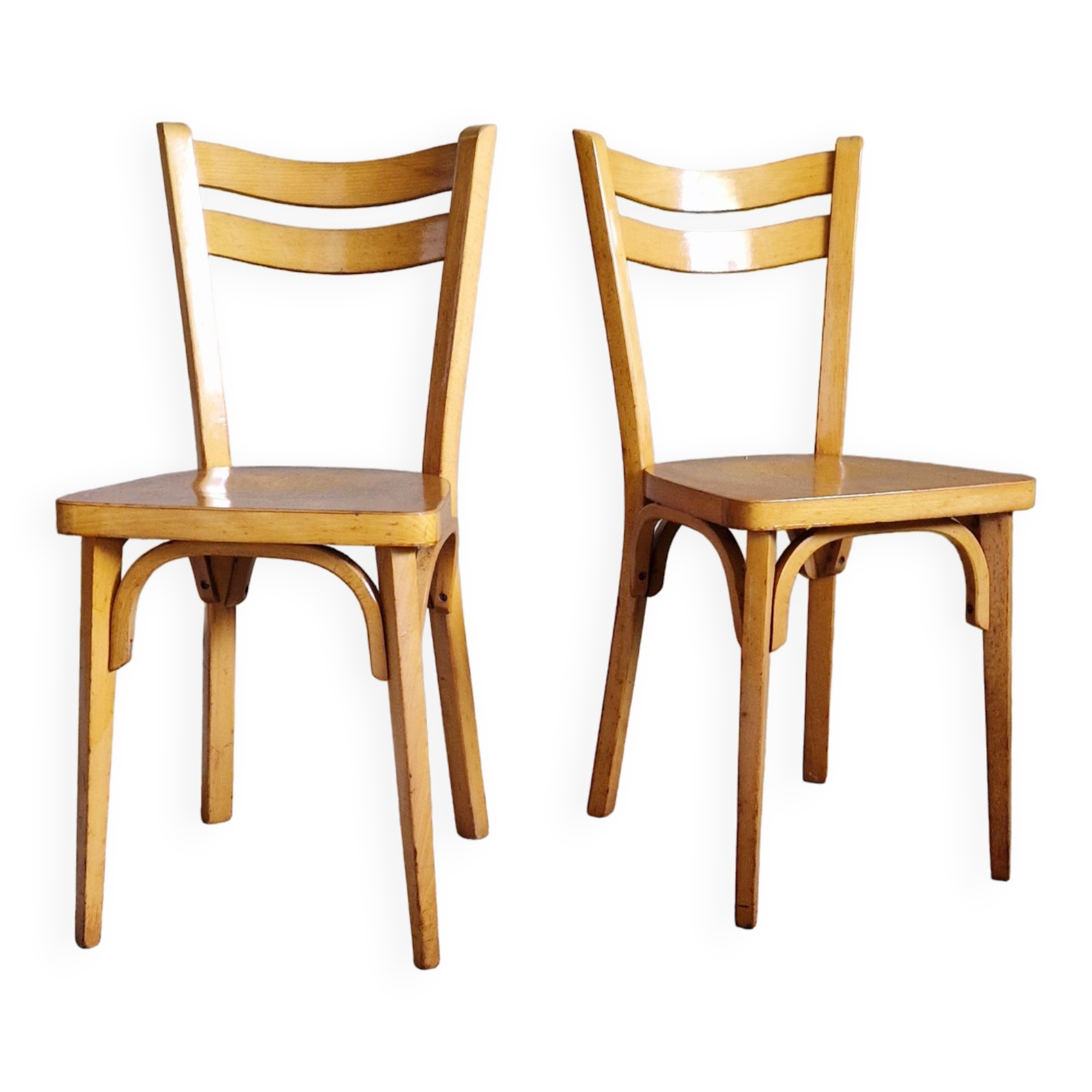 Old and pretty pair of Baumann bistro chairs