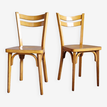 Old and pretty pair of Baumann bistro chairs