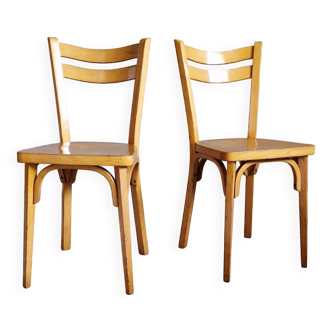 Old and pretty pair of Baumann bistro chairs