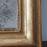 Old gilded mirror and old mercury glass - wall mirror with gold leaf