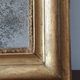Old gilded mirror and old mercury glass - wall mirror with gold leaf