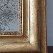 Old gilded mirror and old mercury glass - wall mirror with gold leaf