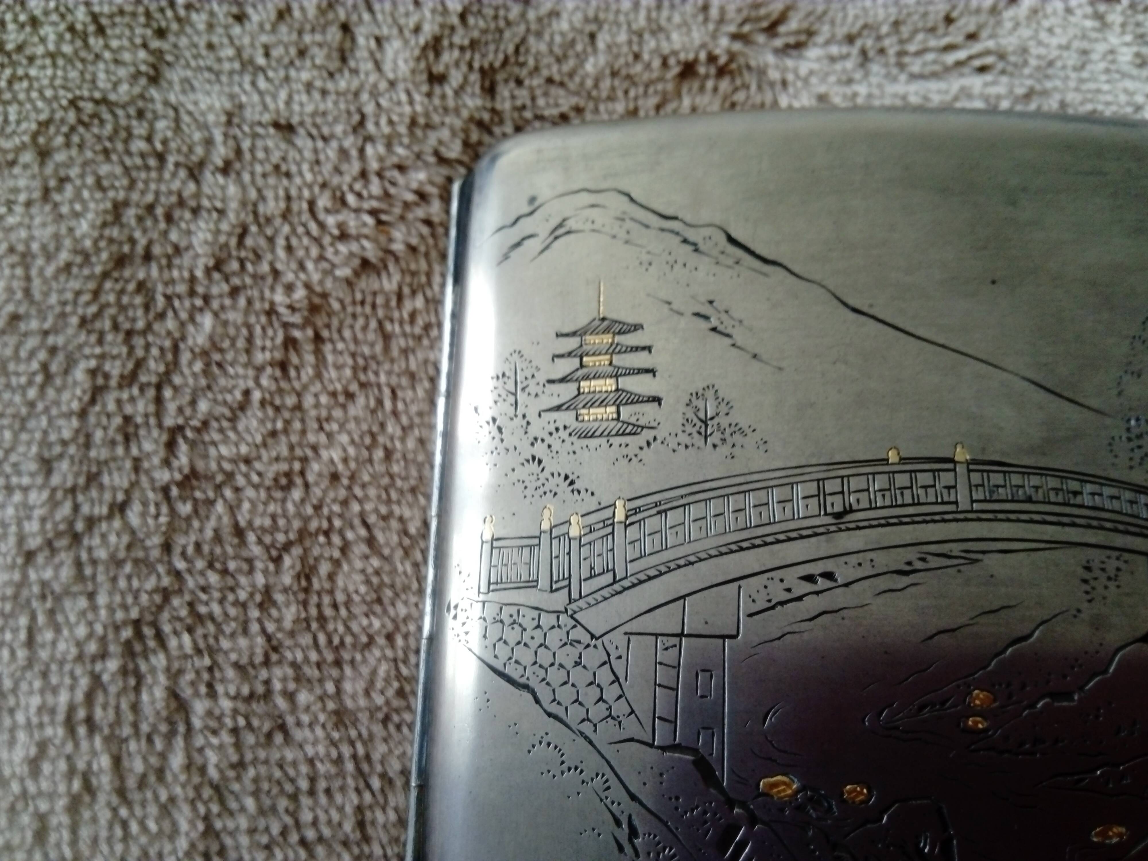 Old sterling silver cigarette case with Japanese decor