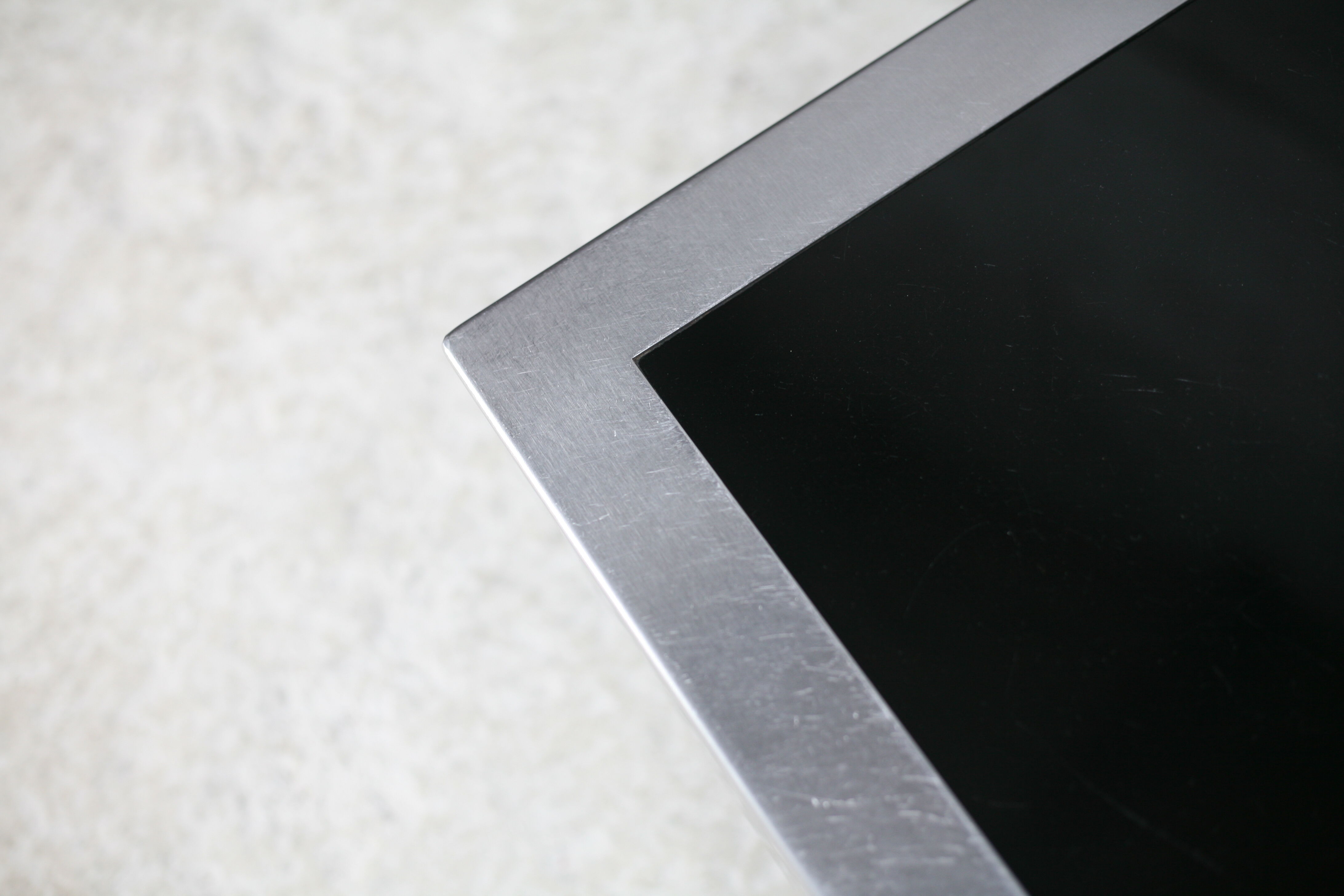 Coffee table in steel and black glass. France, circa 1970