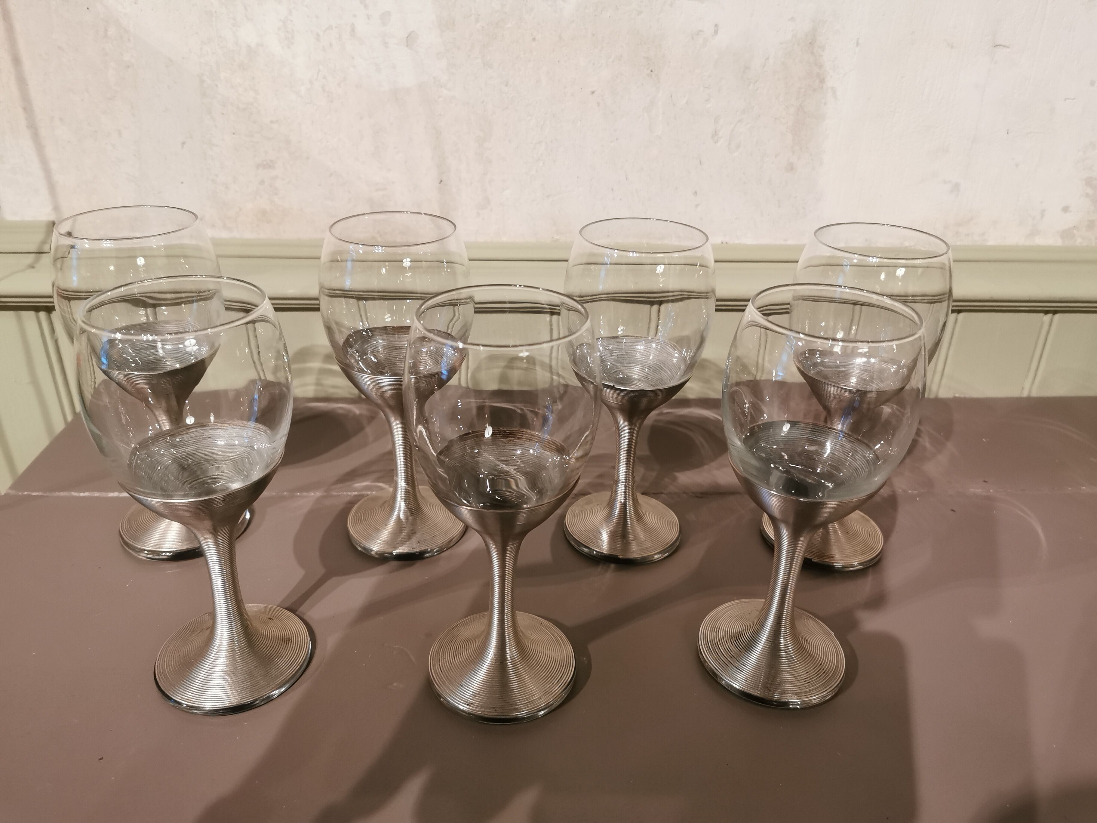 Suite de 7 verres à pied en Maillechort