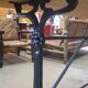 Large bistro table with a wooden top and cast iron legs - 2m56