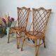 Pair of rattan chairs by Louis Sognot