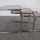 Nested tables with tubular chrome and smoked glass, France 1970.