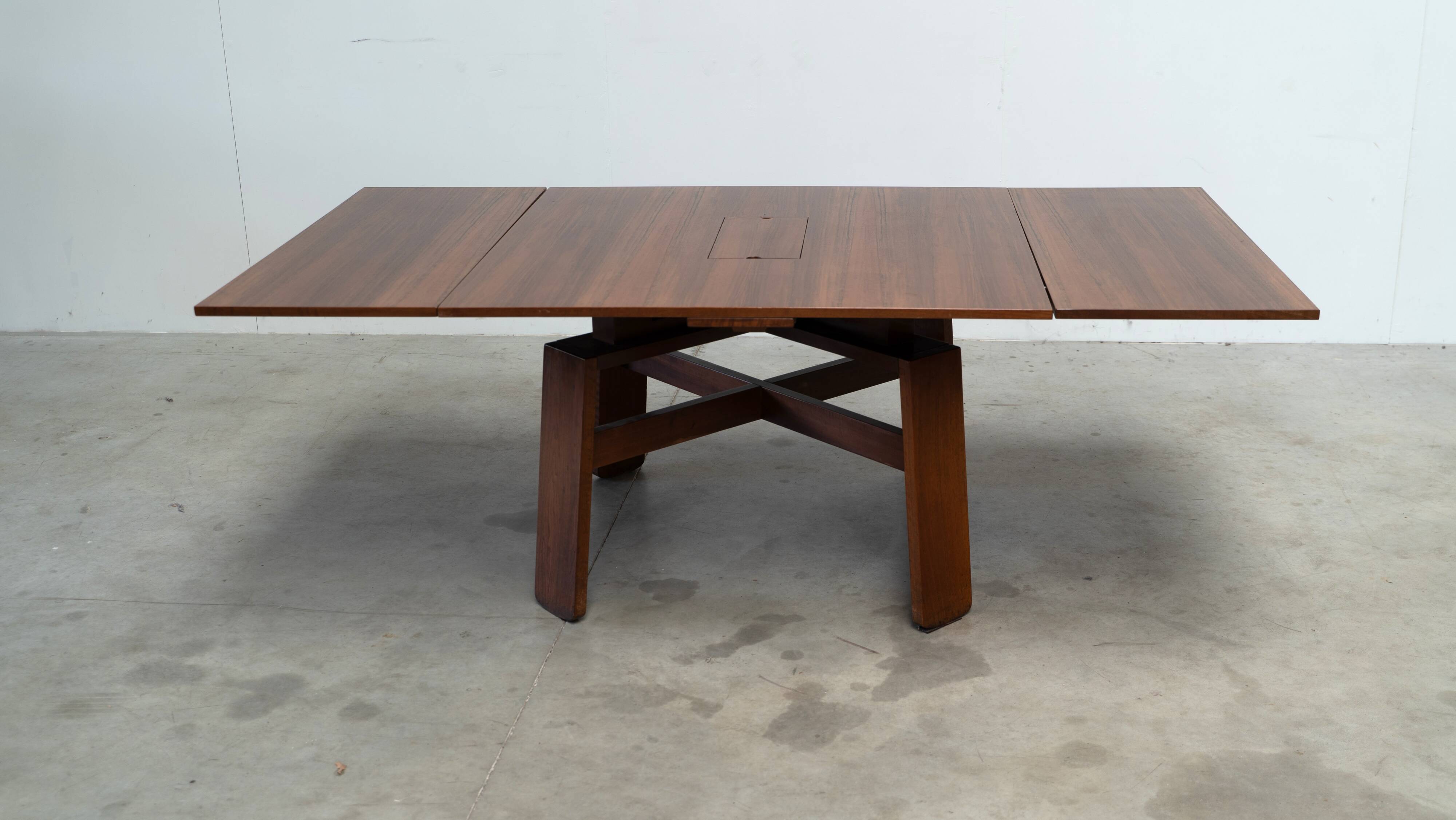 Square extendable dining table by Silvio Coppola for Bernini