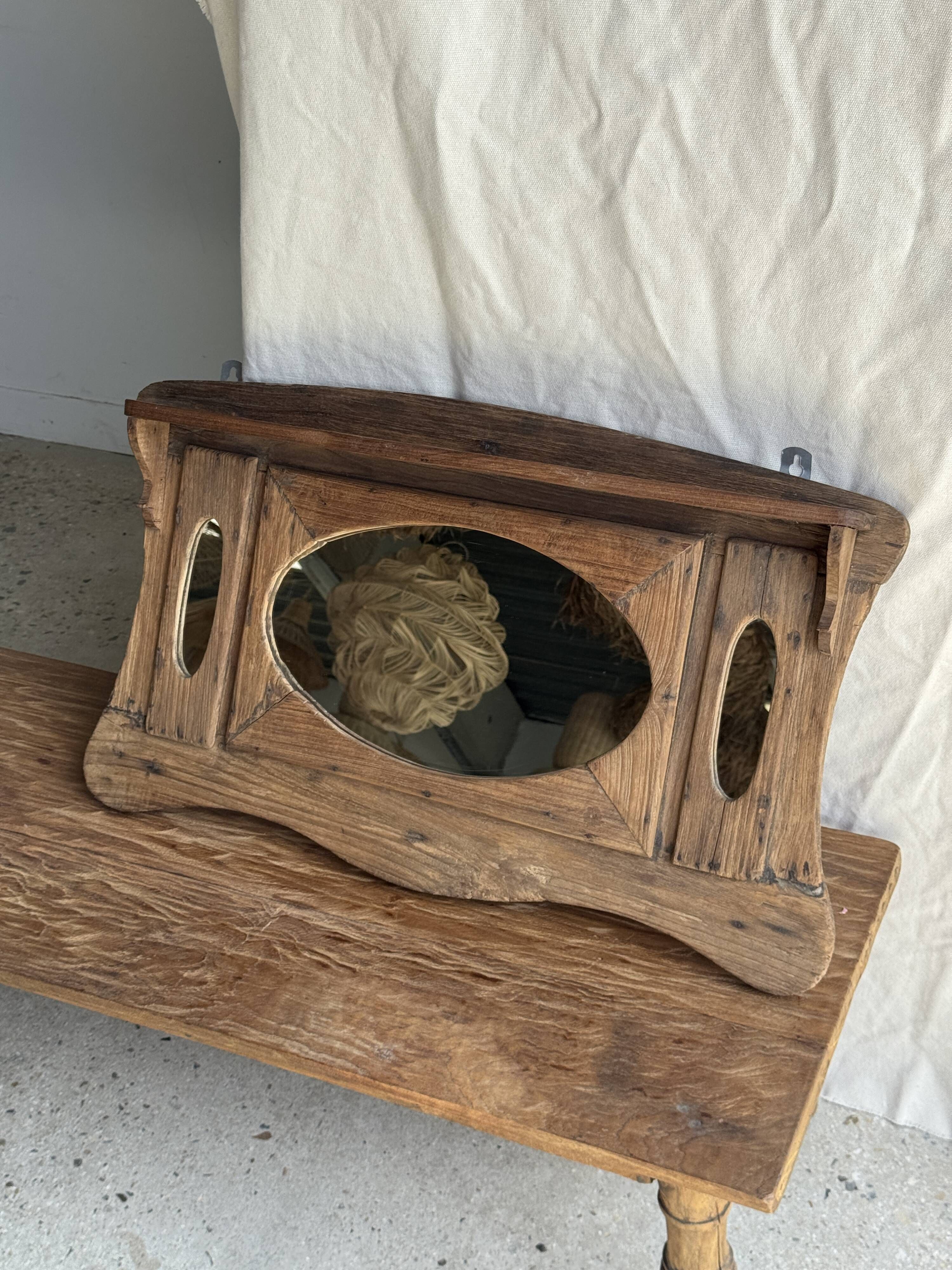 Small wall mirror in organic old Indonesian teak 75x45.