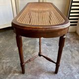 Piano bench in dark wood and cane